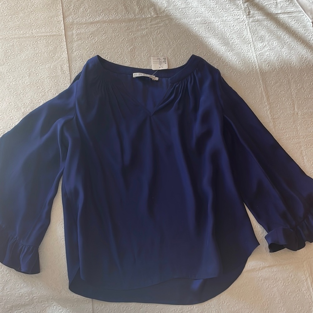 Soft silk navy long sleeve blouse with flowy fun sleeves!